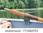 Small photo of boat oar with oarlock