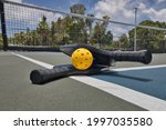 Closeup Of A Pickleball And...