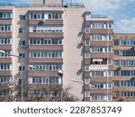 Small photo of New reconditioned old communist apartment building. Ugly traditional communist housing ensemble