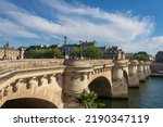 Small photo of Paris, France - July 13th 2022: Pont Neuf, Paris oldest bridge, Ile de la Cite