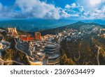 Small photo of Aerial Panorama view of lunar castles and French village on the top of Ba Na Hills, streets and campuses at the famous tourist destination of Da Nang, Vietnam. Near Golden bridge.