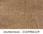 Small photo of Brown and Cream Canvas or rustic jute sackcloth woven fabric texture background. Textiles for coffee beans. High quality photo