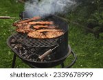 Small photo of grill , day off, holiday with grill, lawn grill, steak, holiday, fresh meat, fried meat, non-vegetarian, good appetite, meat day, in the backyard, summer grill, cook grilling