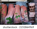 Orange Roof Tiles Stacked In...