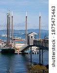 Small photo of Bar Harbor, Maine USA - Picturesque Frenchman Bay off the colorful and often fog shrouded Maine resort town of Bar Harbor is home port for a wide variety of sailing ships and small fishing boats.