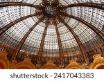 Small photo of Paris, France - Sept. 20, 2018: Located near the Opera Garnier, the Galeries Lafayette Haussmann is an art nouveau retail palace topped by an ornate glass dome that offers dramatic views of Paris.