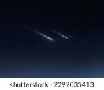 Beautiful shooting stars in the sky. Meteors on a dark background. Meteorites glow in the atmosphere.