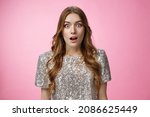 Small photo of Amazed shocked surprised attractive young female singer being chosen lucky girl picked win lottery widen eyes gasping stupor astonished widen eyes amazement, posing impressed pink background
