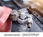 Small photo of Terminal battery broken,The white powder that is on the head of the car battery is a fungus that appears due to an alternator overcharge which can cause overheating at the positive pole.