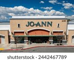 Small photo of 2024 March 19: Santa Clarita, CA. Jo-Ann, JoAnn Fabric and Crafts Store. Store front, blue sky. Drone aerial straight front view of entrance.