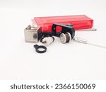 Components of a gas lighter, on a white background