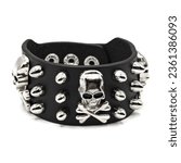Small photo of Black leather bracelet with spikes, skulls and bones. jolly roger Pirate Style, filibuste. An accessory for rockers, bikers, metalheads, goths and punks. Steampunk style. Close-up subject photography.