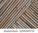 arrangement of bamboo sticks arranged vertically and horizontally to decorate the walls. selective focus