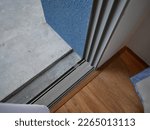 Small photo of A Sliding glass door detail and rail embed in floor