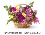 Colorful Flowers In A Basket
