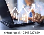 Small photo of Real estate investment, investor buy a house land location. Investor work on laptop computer to invest real estate in office click on increase graph arrow. Facility management concept.