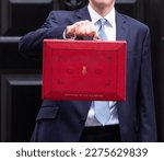 Small photo of London, United Kingdom - March 15 2023: Chancellor of the Exchequer Jeremy Hunt hold ministerial box outside 11 Downing Street ahead of budget statement.