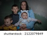 Small photo of KRAMATORSK, UKRAINE - NOVEMBER 17, 2014: dozens of Ukrainian internally displaced persons who fled the Donbas war, which opposes Ukrainian forces to pro-Russia groups, live on charity in a shelter.