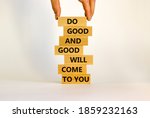 Small photo of Concept of karma motivational words. Wooden blocks on the stack of wooden blocks. Words 'do good and good will come to you'. Beautiful white background, copy space.