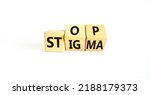 Small photo of Stop stigma symbol. Concept words Stop stigma on wooden cubes. Beautiful white table white background. Business and Stop stigma concept. Copy space.