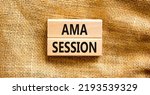 Small photo of AMA ask me anything session symbol. Concept words AMA ask me anything session on wooden blocks on a beautiful canvas background. Business and AMA ask me anything session concept. Copy space.