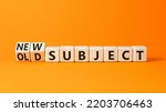 Small photo of Old or new subject symbol. Turned wooden cubes and changed the word old subject to new subject. Beautiful orange table, orange background. Business, old or new subject concept. Copy space.