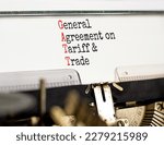 Small photo of GATT symbol. Concept words GATT general agreement on tariff and trade typed on retro typewriter on beautiful white background. Business GATT general agreement on tariff and trade concept. Copy space.