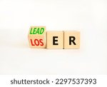 Small photo of Loser or leader symbol. Businessman turns wooden cubes and changes the word Loser to Leader. Beautiful white table white background. Business and loser or leader concept. Copy space.