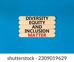 Small photo of DEI Diversity equity inclusion matter symbol. Concept words DEI diversity equity and inclusion matter on wooden stick. Beautiful blue background. Business diversity equity inclusion matter concept.