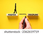 Small photo of Positive discipline symbol. Concept words Positive discipline on beautiful wooden blocks. Beautiful yellow background. Businessman hand. Business psychology positive discipline concept. Copy space.