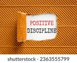 Small photo of Positive discipline symbol. Concept words Positive discipline on beautiful white paper. Beautiful brown paper background. Business psychology positive discipline concept. Copy space.