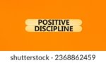 Small photo of Positive discipline symbol. Concept words Positive discipline on beautiful wooden stick. Beautiful orange table orange background. Business psychology positive discipline concept. Copy space.