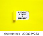 Small photo of Rethink revise rebrand symbol. Concept word Rethink Revise and Rebrand on beautiful white paper. Beautiful yellow background. Business brand motivational rethink revise rebrand concept. Copy space.