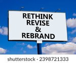 Small photo of Rethink revise rebrand symbol. Concept word Rethink Revise and Rebrand on white billboard. Beautiful blue sky cloud background. Business brand motivational rethink revise rebrand concept. Copy space.
