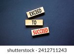 Small photo of Exceed to succeed symbol. Concept words Exceed to succeed on beautiful wooden blocks. Beautiful black table black background. Business and exceed to succeed concept. Copy space.