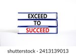 Small photo of Exceed to succeed symbol. Concept words Exceed to succeed on beautiful books. Beautiful white table white background. Business and exceed to succeed concept. Copy space.