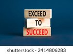 Small photo of Exceed to succeed symbol. Concept words Exceed to succeed on beautiful wooden blocks. Beautiful grey table grey background. Business and exceed to succeed concept. Copy space.