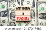 Small photo of Anything is possible symbol. Concept words Anything is possible on beautiful wooden blocks. Dollar bills. Beautiful dollar bills background. Business anything possible concept. Copy space.