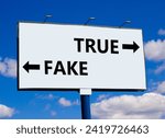 Small photo of True or fake symbol. Concept word True or Fake on beautiful billboard with two arrows. Beautiful blue sky with clouds background. Business and true or fake concept. Copy space.