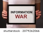 Information war, warfare word on paper. IW concept.