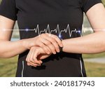 Smart watch, wristwatch bracelet on hand, checking heartbeat, pulse, health care during sports activity, cardio workout