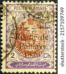 Small photo of Persia, circa 1926. Canceled postage stamp printed by Persia showing the Overprint in memory of Pahlavi