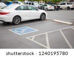 Free space Handicapped parking spot in motel or apartment, transportation infrastructure road markings.