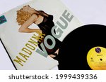 Small photo of Miami, FL, USA; June 2021: House dance artist, Madonna single music album on vinyl record LP disc. Titled: Vogue from the album I'm Breathless album cover