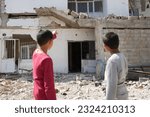 Small photo of A Turkish family inspects the remains of their earthquake-damaged home. Turkiye earthquake 2023. Nordagi, Turkiye May 19, 2023