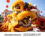 Small photo of Dragon and lion dance show in chinese new year festival (Tet festival ), lion Dance - dragon and lion dance street performances in Vietnam. Holidays and celebrations concept. Selective focus.