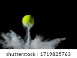 A tennis ball bouncing in chalk ...
