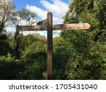 Rustic Wooden Signpost To...