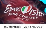 Small photo of Turin, Italy, April 2022: The flag of the Eurovision Song Contest 2022 logo waving in the wind. The 2022 edition will take place in Turin, Italy from 10 to 14 May
