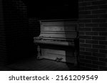 Black And White Piano On The...